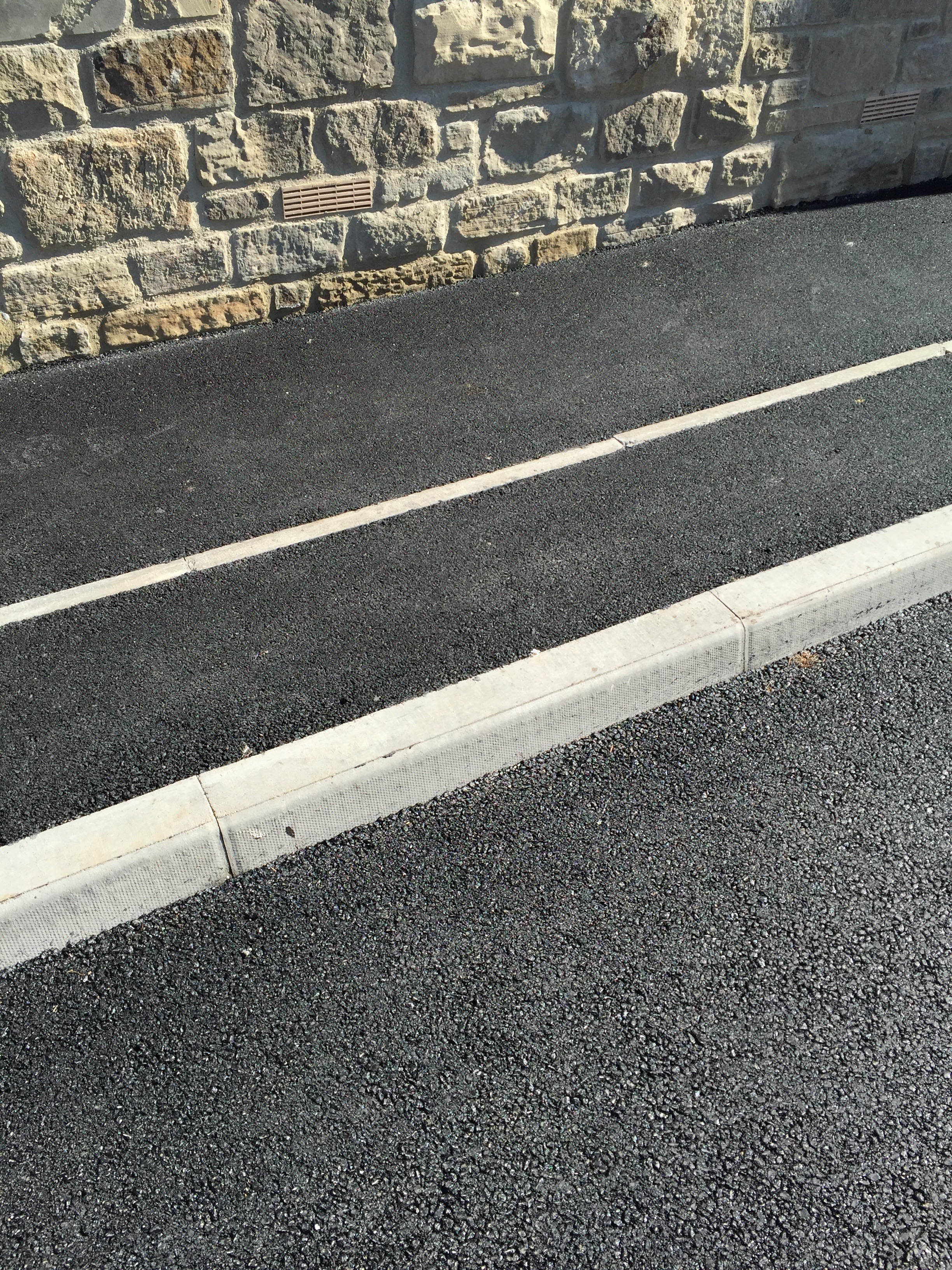 A british-standard-kerb-blackoak-surfacing